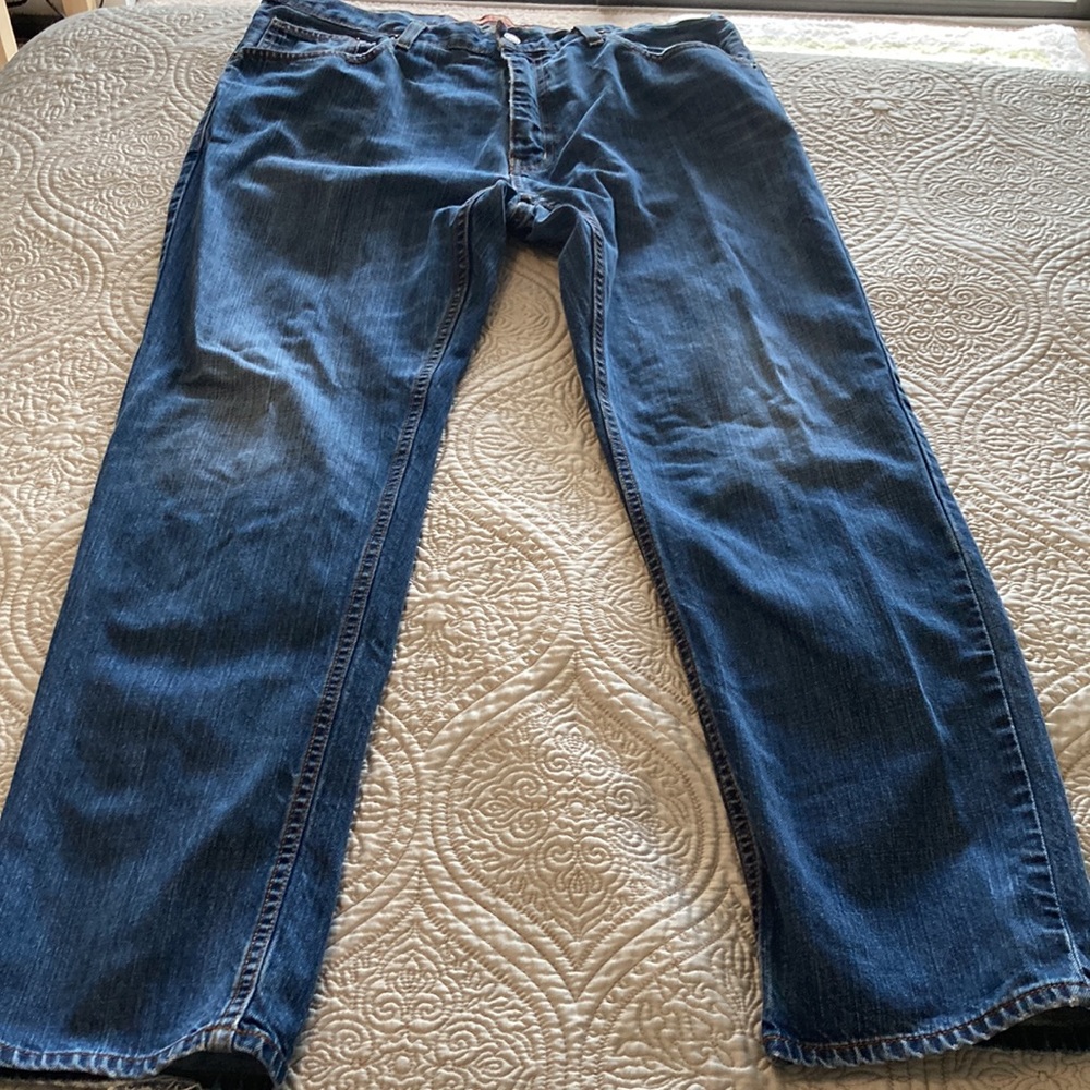 Men’s gently used blue jeans